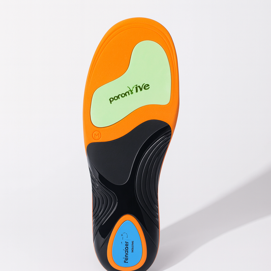 Shoe insole with orange, green, and black design on a white background