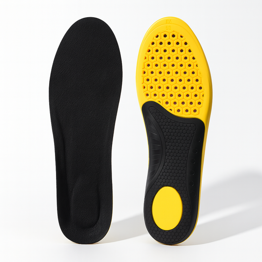 Black and yellow shoe insoles on a white background